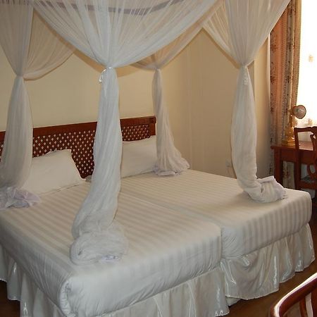 Arusha Tourist Inn Hotel Habitación foto