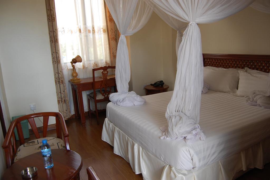 Arusha Tourist Inn Hotel Habitación foto