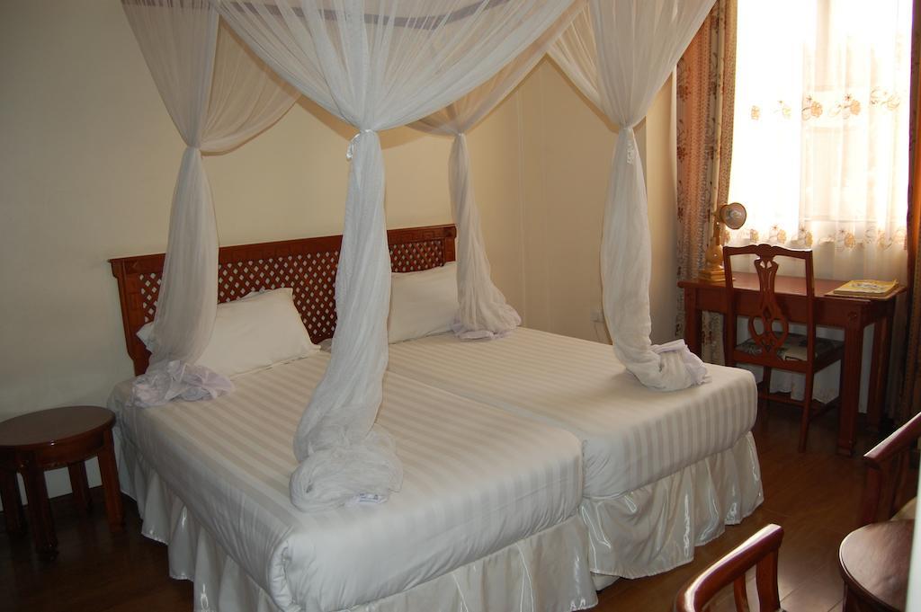 Arusha Tourist Inn Hotel Habitación foto